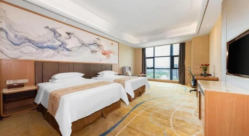 Bed in Venus Royal Hotel Nanning East High-Speed Railway Station