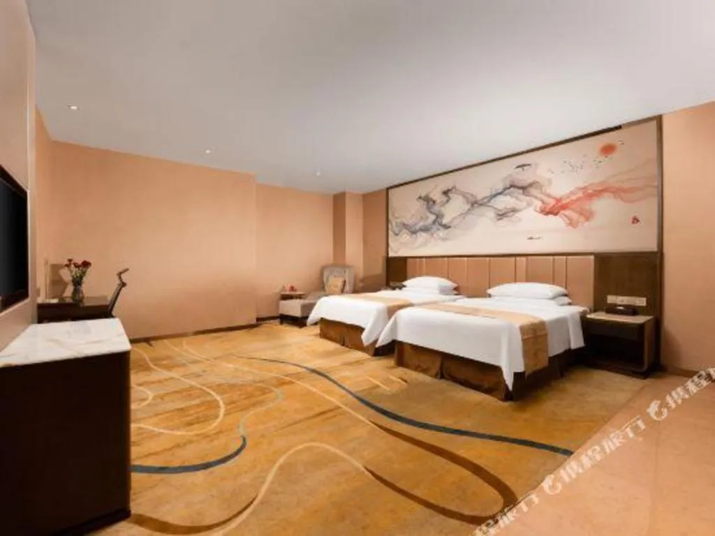 Bed in Venus Royal Hotel Nanning East High-Speed Railway Station