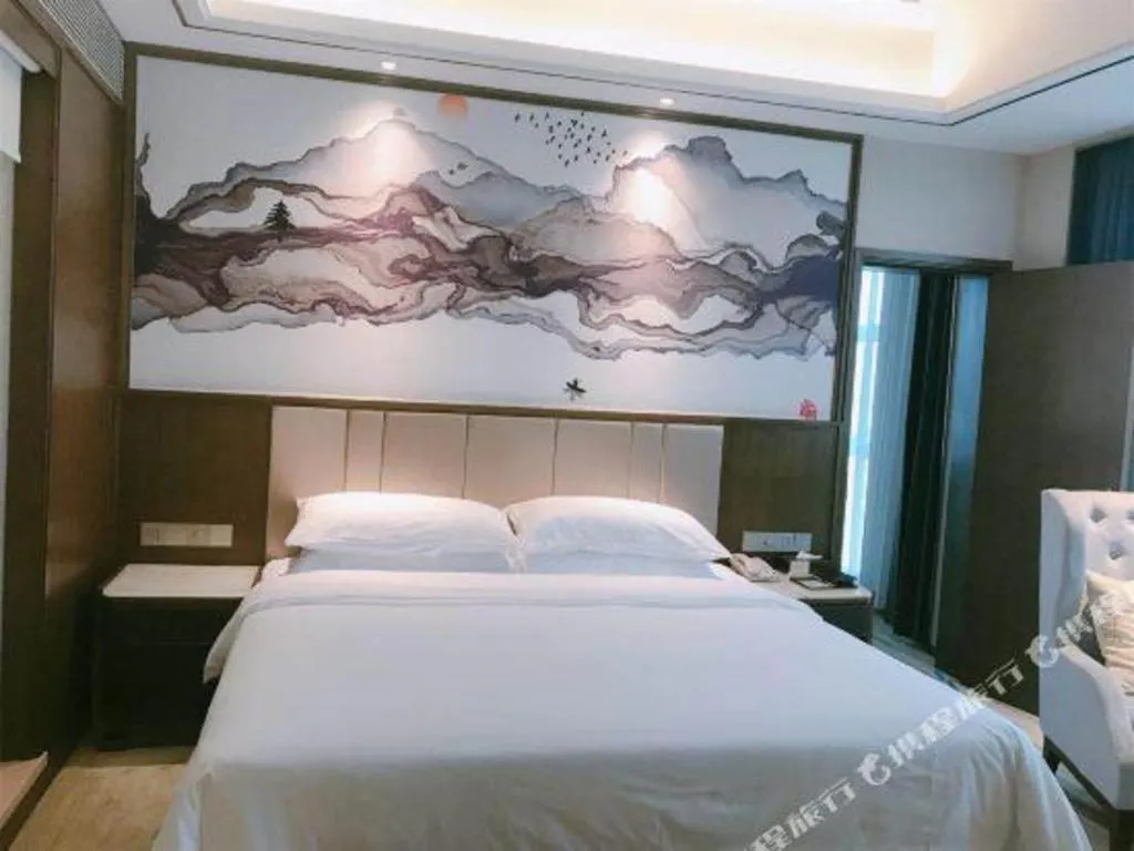 Bed in Venus Royal Hotel Nanning East High-Speed Railway Station