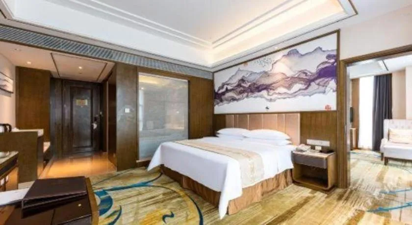 Bed in Venus Royal Hotel Nanning East High-Speed Railway Station