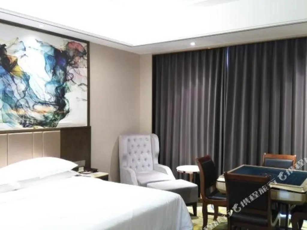 Bed in Venus Royal Hotel Nanning East High-Speed Railway Station