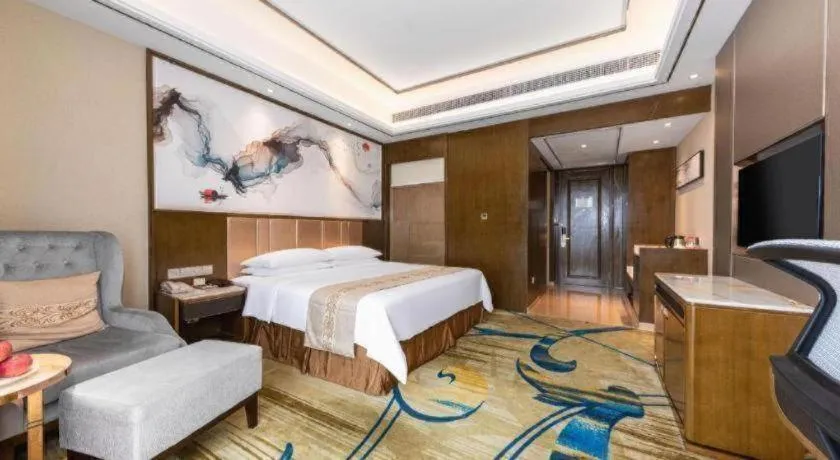 Bed in Venus Royal Hotel Nanning East High-Speed Railway Station