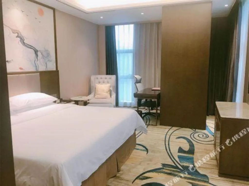 Bed in Venus Royal Hotel Nanning East High-Speed Railway Station