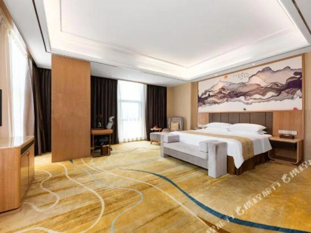 Bed in Venus Royal Hotel Nanning East High-Speed Railway Station