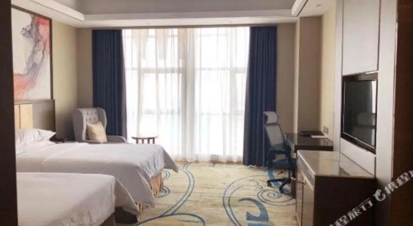 Bed in Venus Royal Hotel Nanning East High-Speed Railway Station