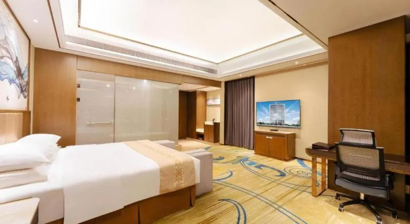 Bed in Venus Royal Hotel Nanning East High-Speed Railway Station