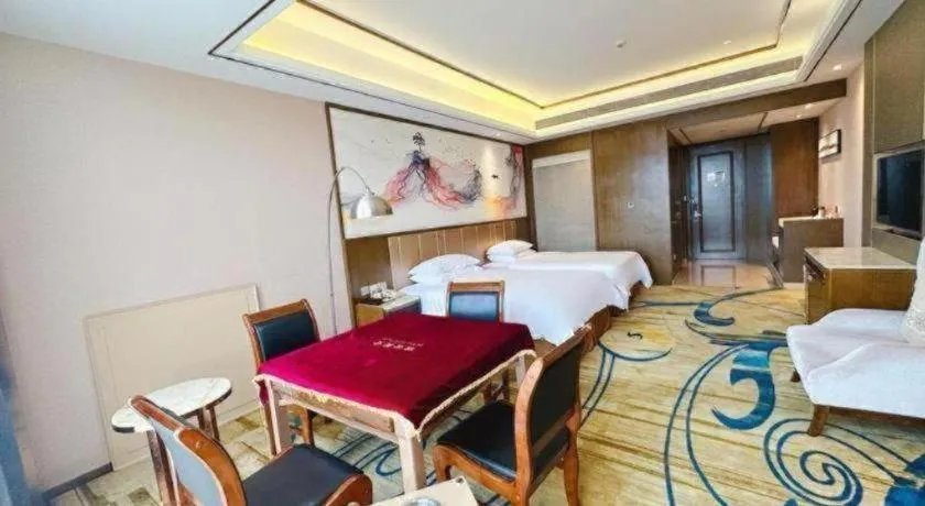 Bed in Venus Royal Hotel Nanning East High-Speed Railway Station