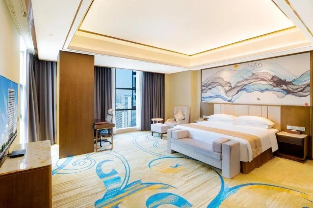 Bed in Venus Royal Hotel Nanning East High-Speed Railway Station