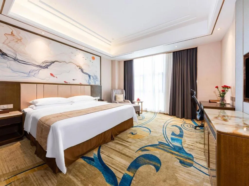 Bed in Venus Royal Hotel Nanning East High-Speed Railway Station