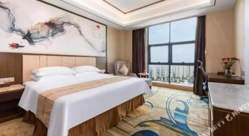 Bed in Venus Royal Hotel Nanning East High-Speed Railway Station