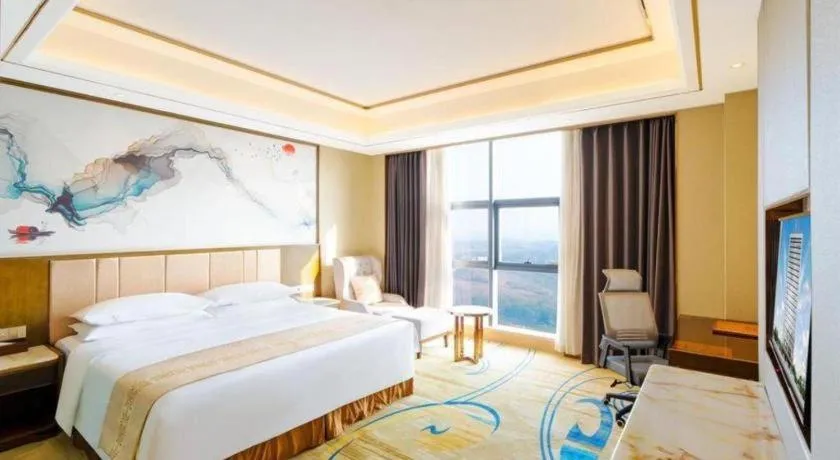 Bed in Venus Royal Hotel Nanning East High-Speed Railway Station