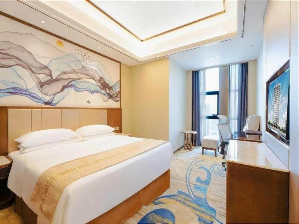 Bed in Venus Royal Hotel Nanning East High-Speed Railway Station