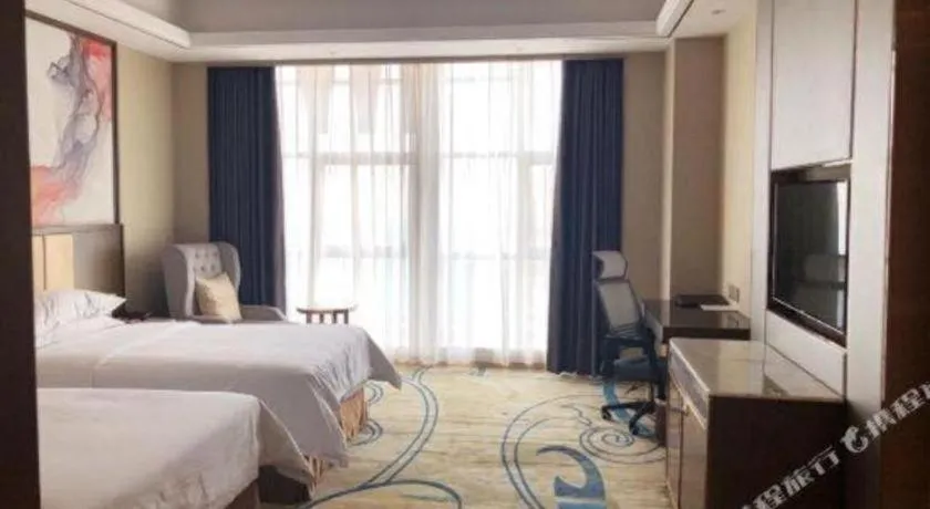 Bed in Venus Royal Hotel Nanning East High-Speed Railway Station