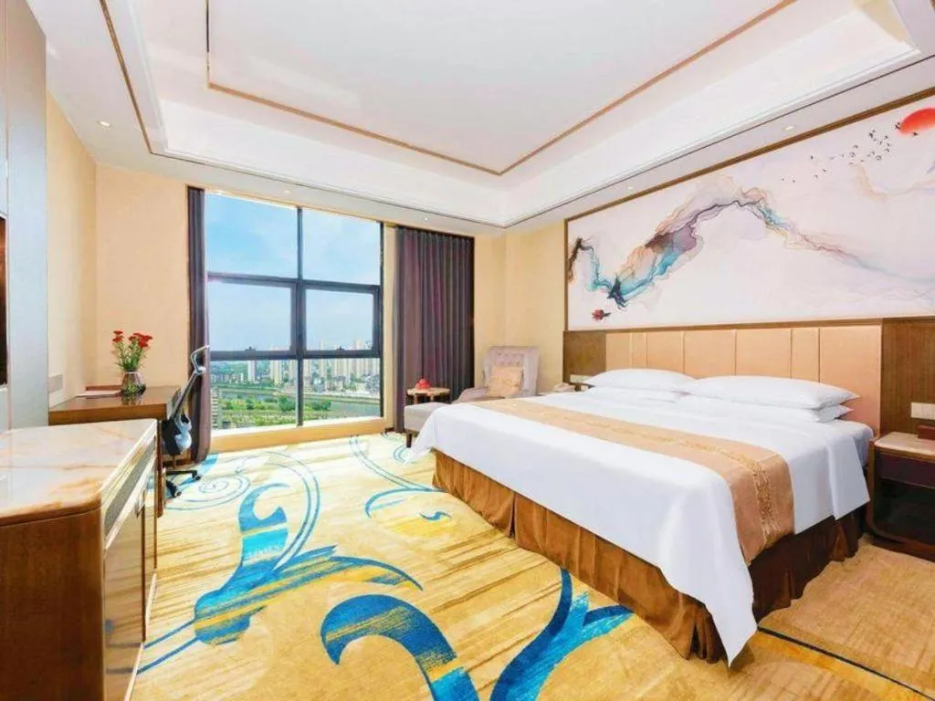Bed in Venus Royal Hotel Nanning East High-Speed Railway Station