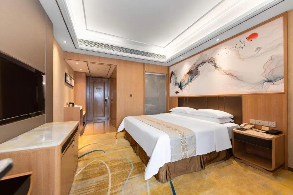 Bed in Venus Royal Hotel Nanning East High-Speed Railway Station