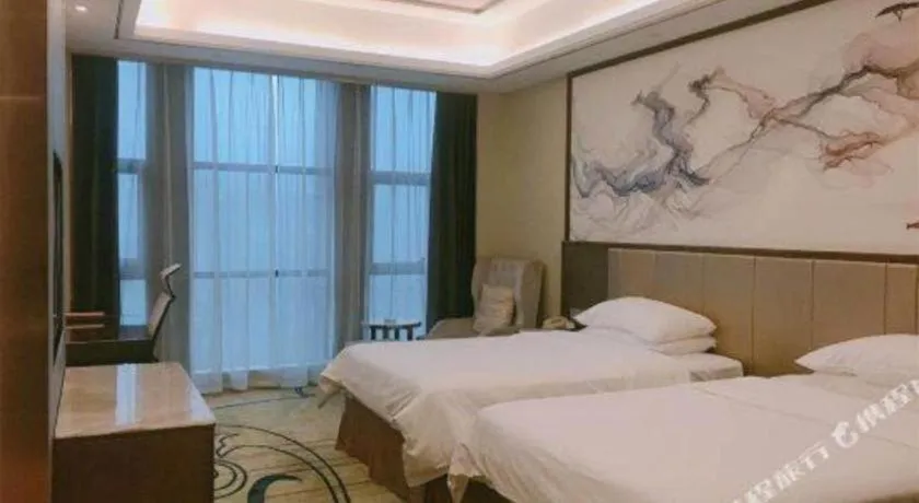 Bed in Venus Royal Hotel Nanning East High-Speed Railway Station