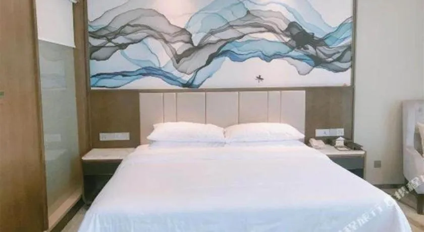 Bed in Venus Royal Hotel Nanning East High-Speed Railway Station