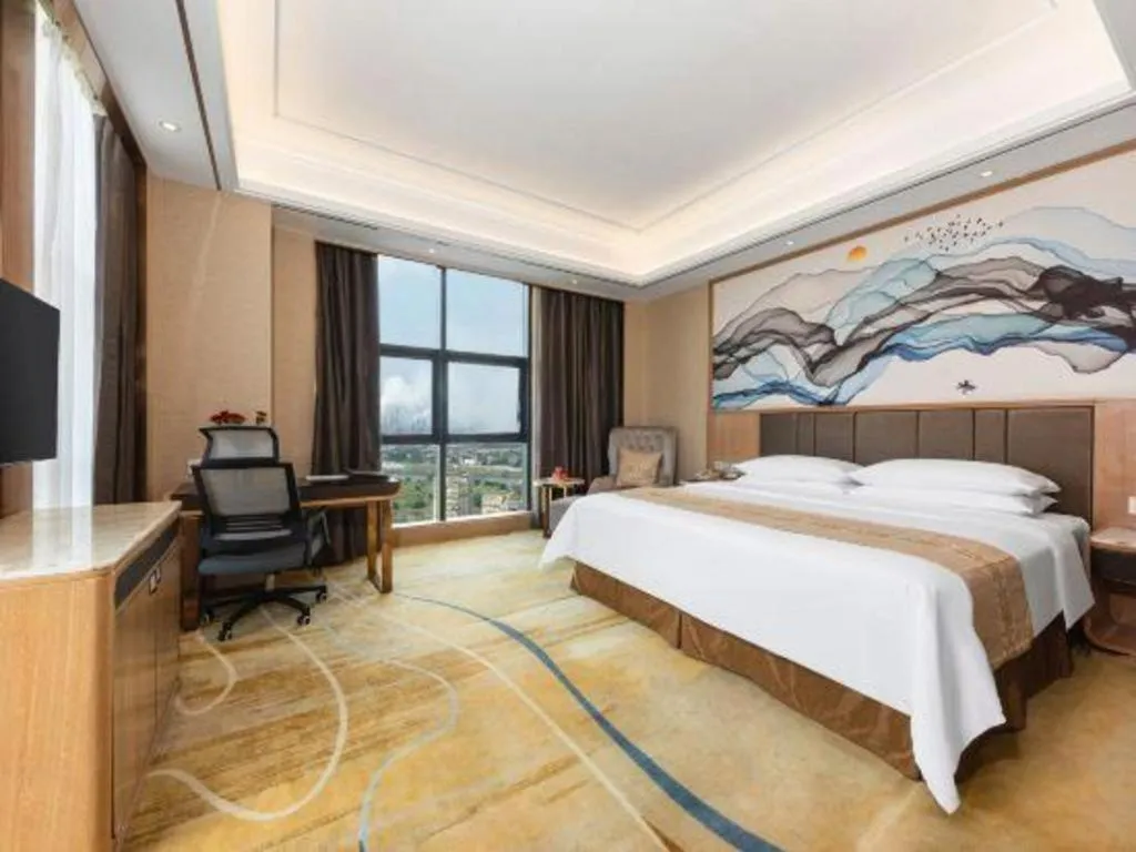 Bed in Venus Royal Hotel Nanning East High-Speed Railway Station