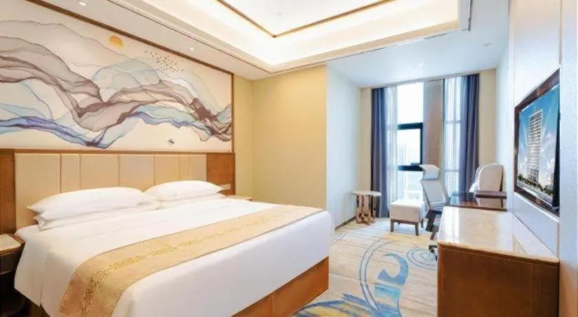 Bed in Venus Royal Hotel Nanning East High-Speed Railway Station