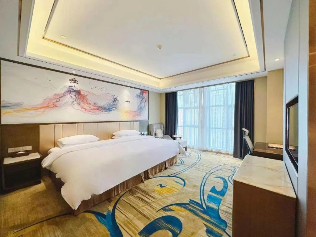 Bed in Venus Royal Hotel Nanning East High-Speed Railway Station