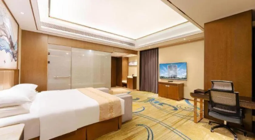 Bed in Venus Royal Hotel Nanning East High-Speed Railway Station