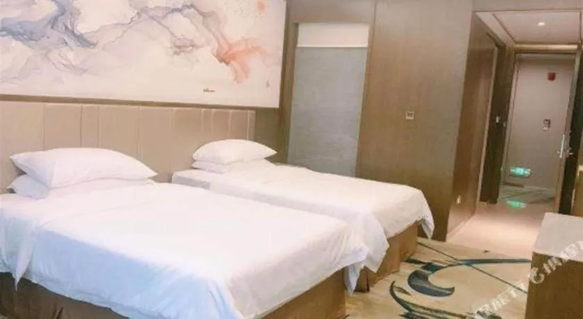 Bed in Venus Royal Hotel Nanning East High-Speed Railway Station