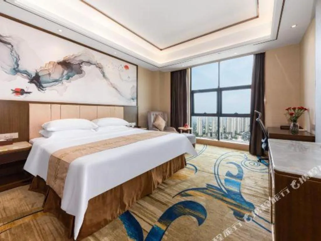 Bed in Venus Royal Hotel Nanning East High-Speed Railway Station