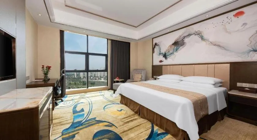 Bed in Venus Royal Hotel Nanning East High-Speed Railway Station
