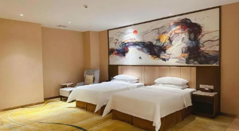 Bed in Venus Royal Hotel Nanning East High-Speed Railway Station