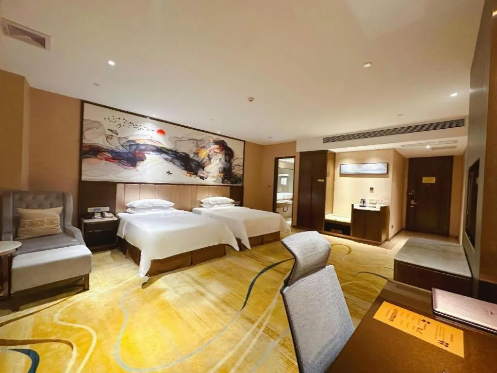 Bed in Venus Royal Hotel Nanning East High-Speed Railway Station