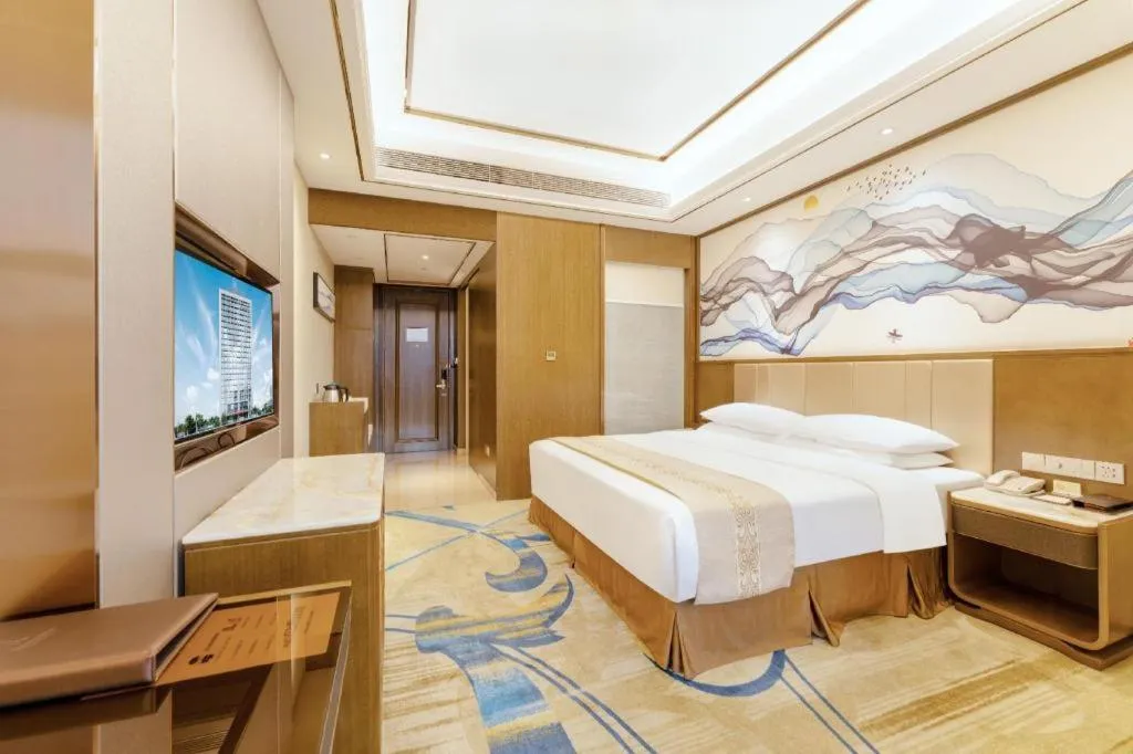 Bed in Venus Royal Hotel Nanning East High-Speed Railway Station