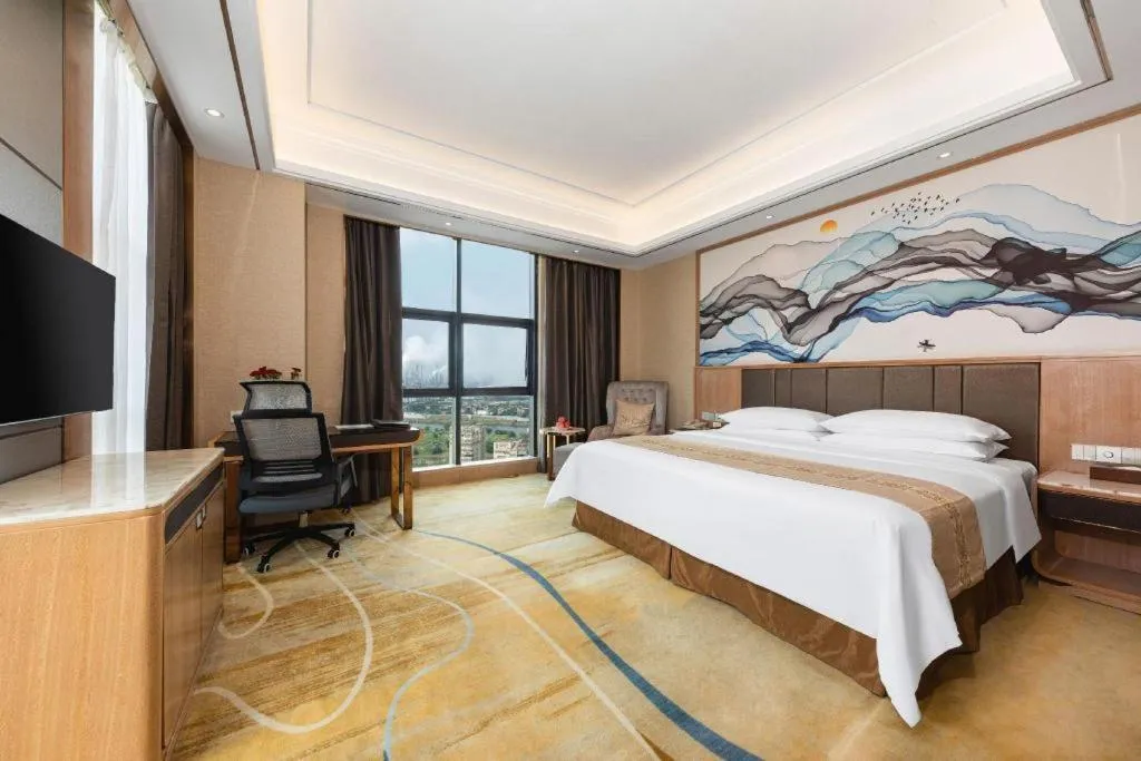 Bed in Venus Royal Hotel Nanning East High-Speed Railway Station