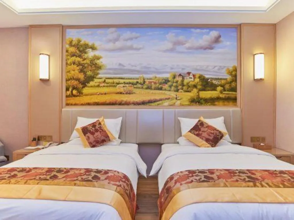 Bed in Vienna Hotel Fuzhou University Town Boshihou