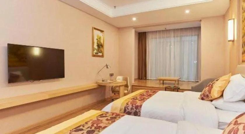 Bed in Vienna Hotel Fuzhou University Town Boshihou