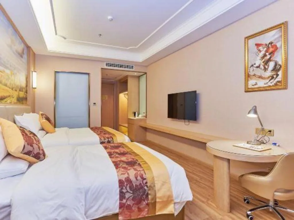 Bed in Vienna Hotel Fuzhou University Town Boshihou