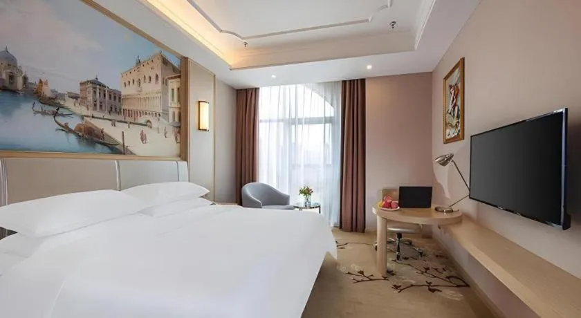 Bed in Vienna Hotel Fuzhou University Town Boshihou