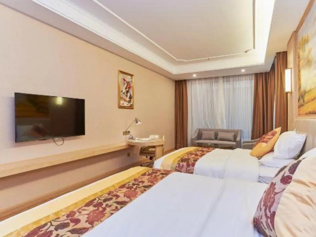 Bed in Vienna Hotel Fuzhou University Town Boshihou