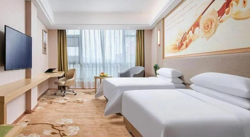Bed in Vienna Hotel Zhejiang Quzhou Jianglang Mountain Scenic Area Xiakou