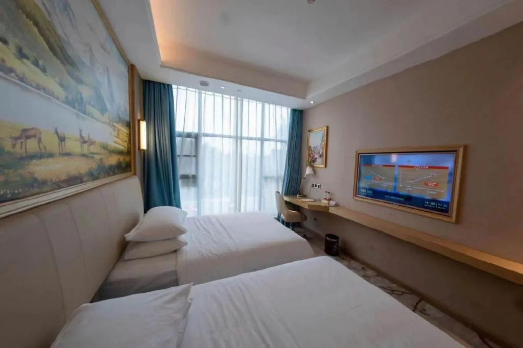 Bed in Vienna Hotel Guangdong Zhaoqing East Station Dinghu Mountain Scenic Area