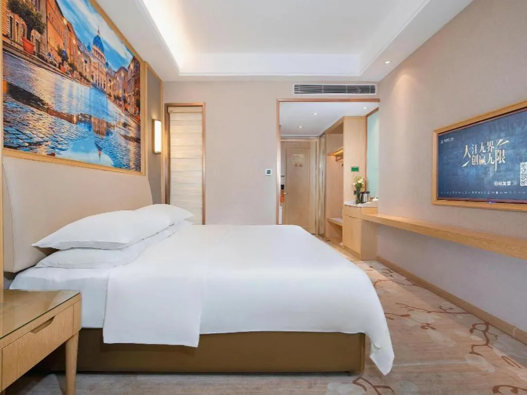 Bed in Vienna Hotel Guangdong Zhaoqing East Station Dinghu Mountain Scenic Area