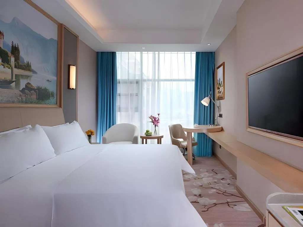 Bed in Vienna Hotel Guangdong Zhaoqing East Station Dinghu Mountain Scenic Area