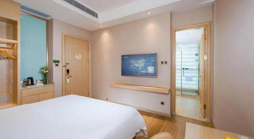 Bed in Vienna Hotel Guangdong Zhaoqing East Station Dinghu Mountain Scenic Area