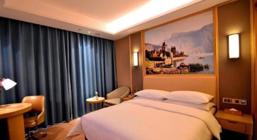 Bed in Vienna Hotel Guangdong Zhaoqing East Station Dinghu Mountain Scenic Area