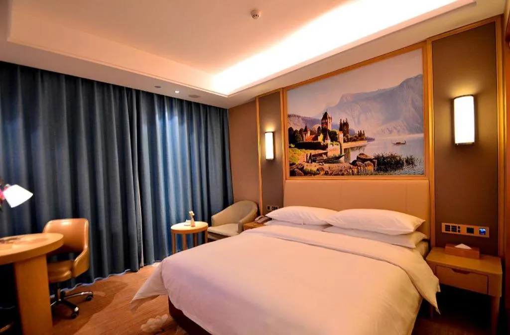 Bed in Vienna Hotel Guangdong Zhaoqing East Station Dinghu Mountain Scenic Area