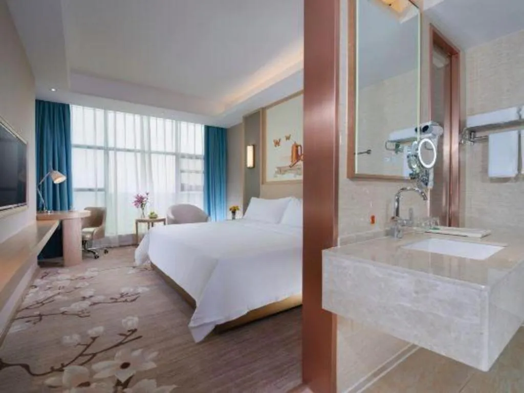 Bed in Vienna Hotel Guangdong Zhaoqing East Station Dinghu Mountain Scenic Area