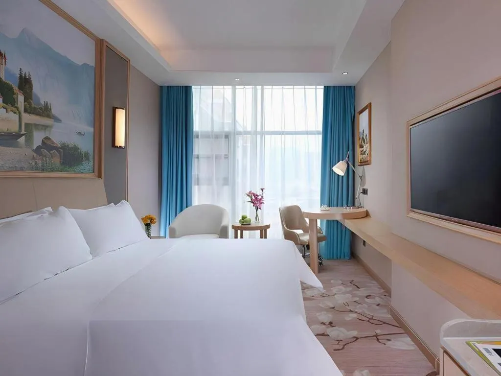 Bed in Vienna Hotel Guangdong Zhaoqing East Station Dinghu Mountain Scenic Area