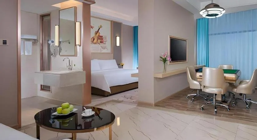 Bed in Vienna Hotel Guangdong Zhaoqing East Station Dinghu Mountain Scenic Area