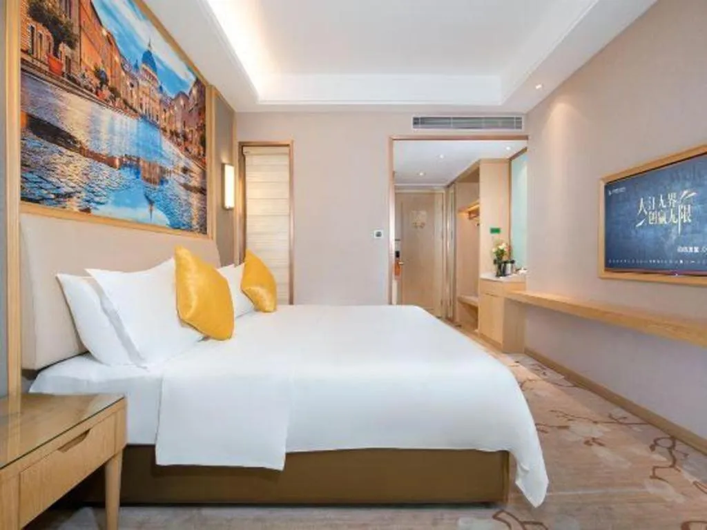 Bed in Vienna Hotel Guangdong Zhaoqing East Station Dinghu Mountain Scenic Area