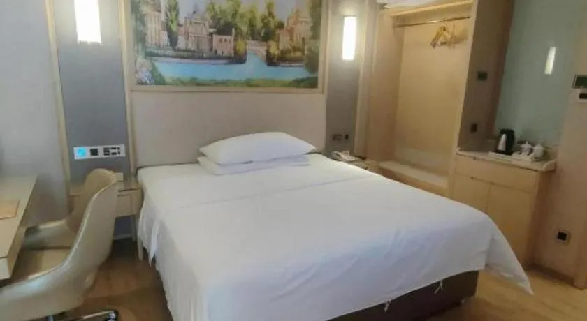 Bed in Vienna Hotel Guangdong Zhaoqing East Station Dinghu Mountain Scenic Area