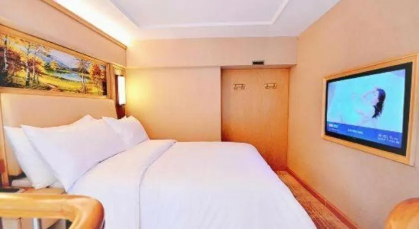 Bed in Vienna Hotel Guangdong Zhaoqing East Station Dinghu Mountain Scenic Area